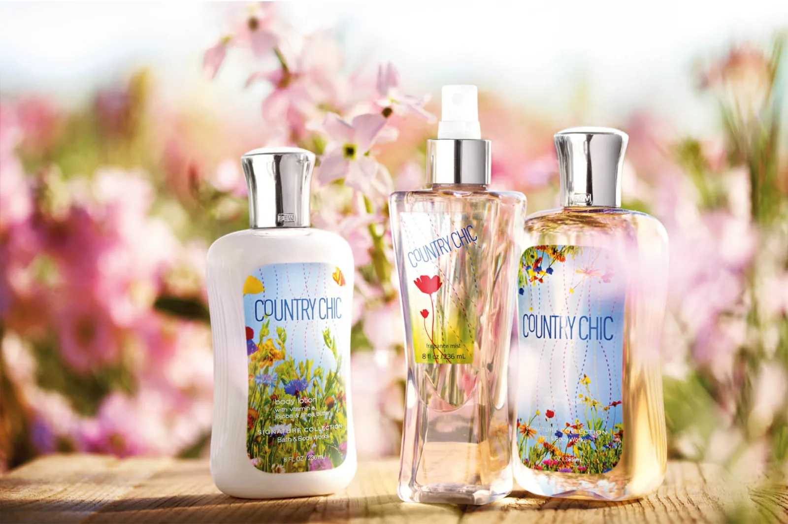 Lotion, mist and shower gel on weathered board, the wildflower label repeated three times