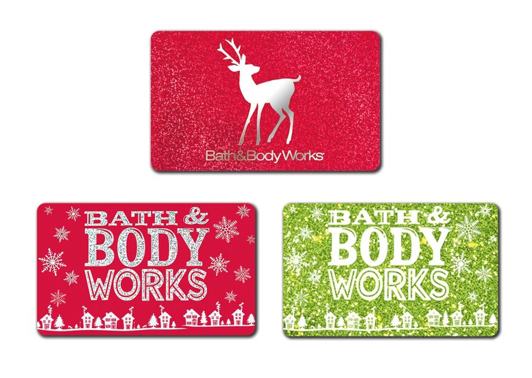 Three gift cards, a silver reindeer on glitter red and a snowed village on red and green
