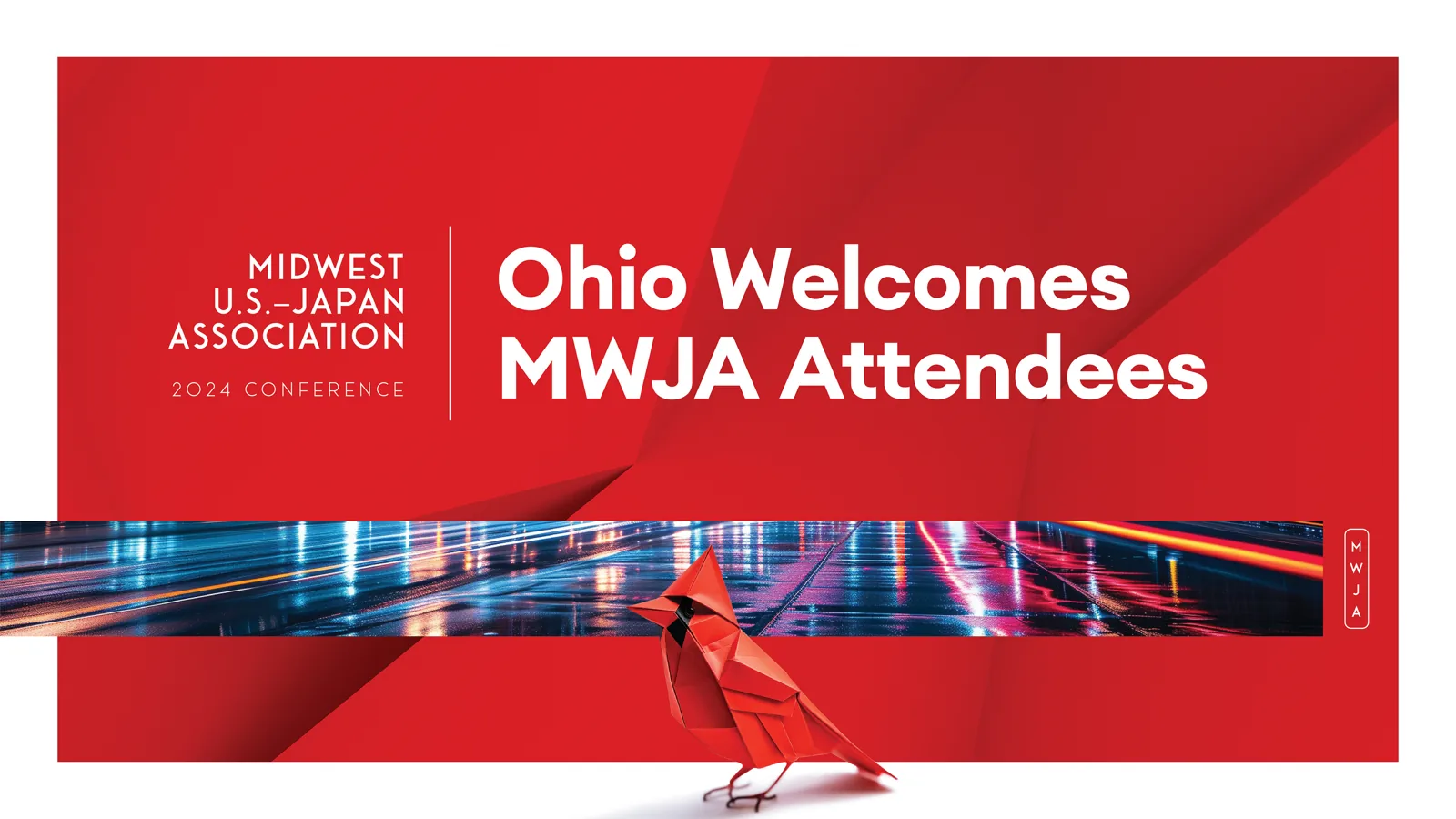 The conference key art, a folded paper cardinal walking across a red field